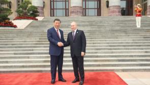 Chinese President Xi Jinping (L) received Russian President Vladimir Putin at the square outside the east gate of the Great Hall of the People before the welcome ceremony and talks, Beijing, May 16, 2024