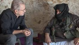 Jürgen Todenhöfer taking interview with rebel commander Abu al-Ezz