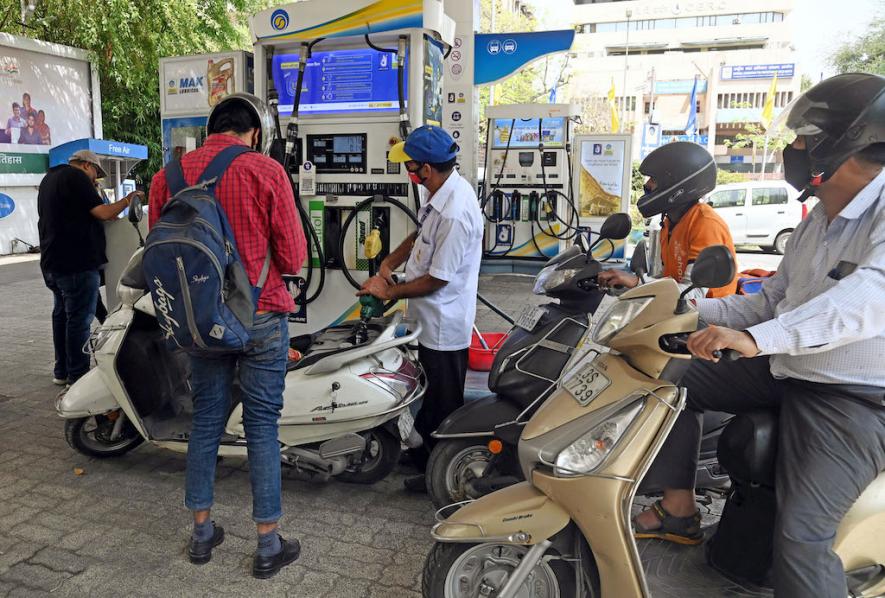 Apr 11 (ANI): An attendant refills a two-wheeler with fuel as petrol prices continue to rise, at a petrol pump, in New Delhi on Monday.