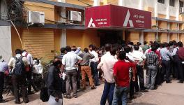 People Standing in Queue for Depositing and Exchanging Currency.