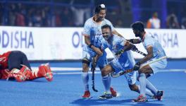 Indian hockey team players celebrate in the match against South Africa a the FIH Men's Hockey World Cup