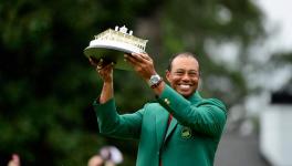 Tiger Woods celebrates with the 2019 Augusta Masters trophy