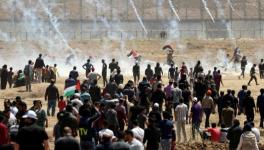 Tear gas canisters fired upon protesters by Israeli forces at the Gaza border 