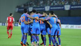 Indian football team players celebrate a goal against Tajikistan in intercontinental Cup