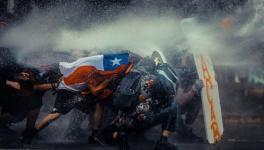 Chileans resisting on the streets of Santiago on November 11. Photo: Javier Vergara