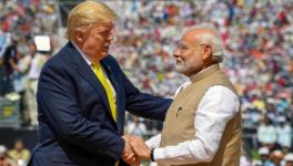 PM Modi shakes hands with US President Donald Trump at "Namaste Trump"event held in Ahmedabad.