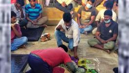 STRANDED FISHERMEN MOURNING THE DEATH OF 22-YEAR-OLD RAJU