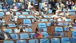 Members of the Lower House of Nepal’s Parliament applaud after the House unanimously passed a bill to approve the country’s new political map in Kathmandu on June 13, 2020. 