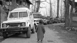 (A boy looks at armed forces’ vehicles during a counter-insurgency operation in Tral area of Pulwama in South Kashmir on June 25, 2020). Picture: Kamran Yousuf/NewsClick