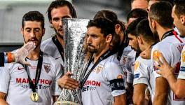 Jesus Navas and Sevilla teammates lift Europa League trophy