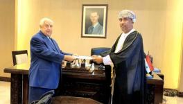 Walid al-Muallem, Syria’s deputy prime minister and foreign minister (L) receives the credentials of Oman’s Ambassador Turki bin Mahmood al-Busaidy, Damascus, October 5, 2020 