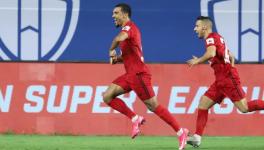 Kwesi Appiah of Northeast United FC scores against Mumbai City FC