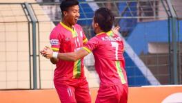 Bidyashagar Singh and Komron Tursunov of Trau FC in the I-league