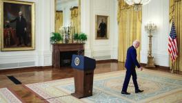 US President Joe Biden departs after delivering remarks on Russia in the East Room at White House, Washington, DC, April 15, 2021