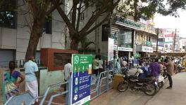 People standing in queue in Tirupur, Tamil Nadu to buy medicines.