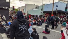 Protesters stage a demonstration against the evictions in Echo Park in Los Angeles. Photo: Leonardo Vilchis