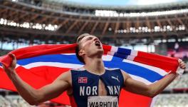 Karsten Warholm of Norway celebrates his record and gold medal at Tokyo Olympics
