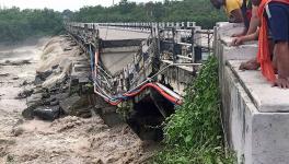 critical Dehradun-Rishikesh bridge on the Jhakan river, that left thousands of commuters scrambling for alternate routes. 