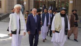 Uzbekistan Foreign Minister Abdulaziz Kamilov (left) escorted by Acting Taliban Foreign Minister Amir Khan Muttaqi (R) and Deputy Prime Minister Mullah Abdus Salam (L), Kabul, October 7, 2021 
