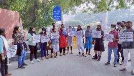 Students gathered on Monday outside of Lady Shri Ram College for a candlelight vigil. Courtesy - Special Arrangement