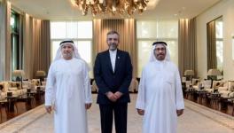 Iran’s Dy Foreign Minister Ali Bagheri Kani (C) with diplomatic adviser to UAE President Anwar Gargash (L) and Minister of State for Foreign Affairs Khalifa Almara, Abu Dhabi, Nov. 16, 2021 