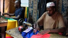 Tailors busy stitching Russian flags to meet rising demand in Bamako, the capital of Mali, December 26, 2021  