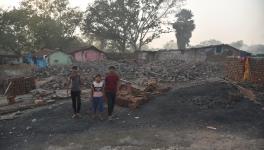 Families continue living dangerously in Barafkal New Colony close to the Rajapur Open Cast Mines in Dhanbad where land subsidence and underground fires is common