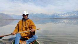 Lake Wular fishermen like Daseer Dar (pictured) say they spend days in search of catch, only to return home empty-handed