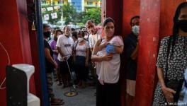 People had queued up at voting booths before polls opened at 6 am local time. 