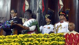 Chief Justice of India (CJI) Justice NV Ramana administers the oath of office to President Droupadi Murmu, as former President Ram Nath Kovind looks on, at the Central Hall of the Parliament,
