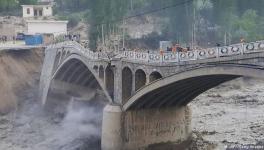 A bridge in Hassanabad village collapsed due to flash floods created after a glacial lake outburst