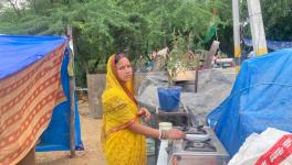 2. Heera Devi, outside the temporary tent shed. Her 2 room house was destroyed on 8th August’s demolition drive