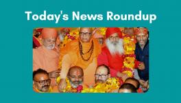 Devotees garland the saints at the ongoing three-day Dharma Sansad, in Haridwar 