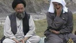 An Al-Jazeera TV image of Osama bin Laden (R)  listening as his top deputy Ayman al-Zawahri speaks at an undisclosed location circa 2002.