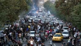 Iranian anti-government protesters chanted from windows and rooftops in parts of Tehran early Thursday