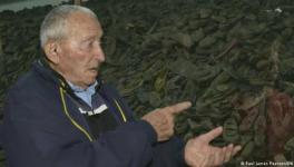 Holocaust survivor Arie Pinsker lauds new efforts to preserve 8,000 shoes of the youngest victims of Auschwitz.