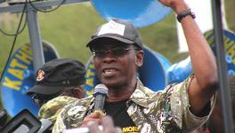 Nnimmo Bassey speaks at the protest during (COP) in Durban, South Africa in 2011.