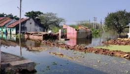 Damaged homes provide testimony of the devastation caused by rains