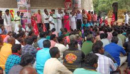 Leaders of the CPI(M) and TNTA leading the protest if the Malai Vedan community members in front of the District Collector office, Dindigul 