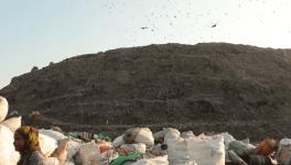 BJP carries the unenviable baggage of 15 years of rule marked with mismanagement of many basic functions, especially sanitation and garbage disposal. (Image: Bhalaswa Landfill)