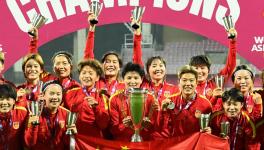 China's football focus switches to women