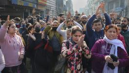 Kashmiri Pandits raise slogans during their protest demanding their relocation after alleged targeted killings of Hindus in J&K, outside Raj Bhawan in Jammu, Monday, Jan. 2, 2023.