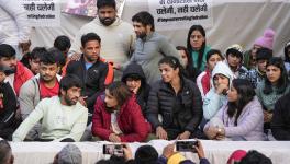 Wrestlers Vinesh Phogat, Sakshi Malik, Bajrang Punia and others during their ongoing protest against the Wrestling Federation of India (WFI), at Jantar Mantar in New Delhi, Friday, Jan. 20, 2023.