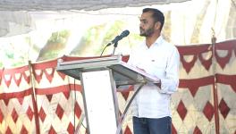 Chand Pasha recites his poem at the Jana Sahitya Sammelana
