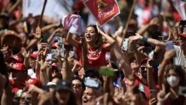 Lula da Silva’s supporters cheer as he arrives for his inauguration ceremony as Brazil’s new president, Brasilia, Jan. 1, 2023 