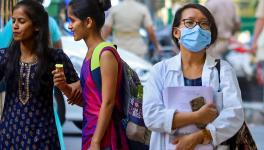 A medical student wears a mask for protection against diseases including H3N2 and Covid virus, at a government hospital, in Bengaluru, Friday, Mar 10, 2023.
