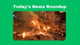 Vehicles set on fire by miscreants during clashes between two groups, at Kajipara in Howrah district, on Thursday.