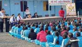 Maya Vishwakarma, along with other teachers of a Government Girls Higher Secondary School in Narsinghpur, provide information related to menstruation and hygiene