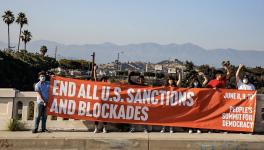 Activists in Los Angeles, California hold banner against sanctions ahead of the OAS Summit of the Americas and the counter People's Summit for Democracy. Photo: Midia Ninja