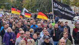Germany’s far-right protesters fly national flag at demonstration